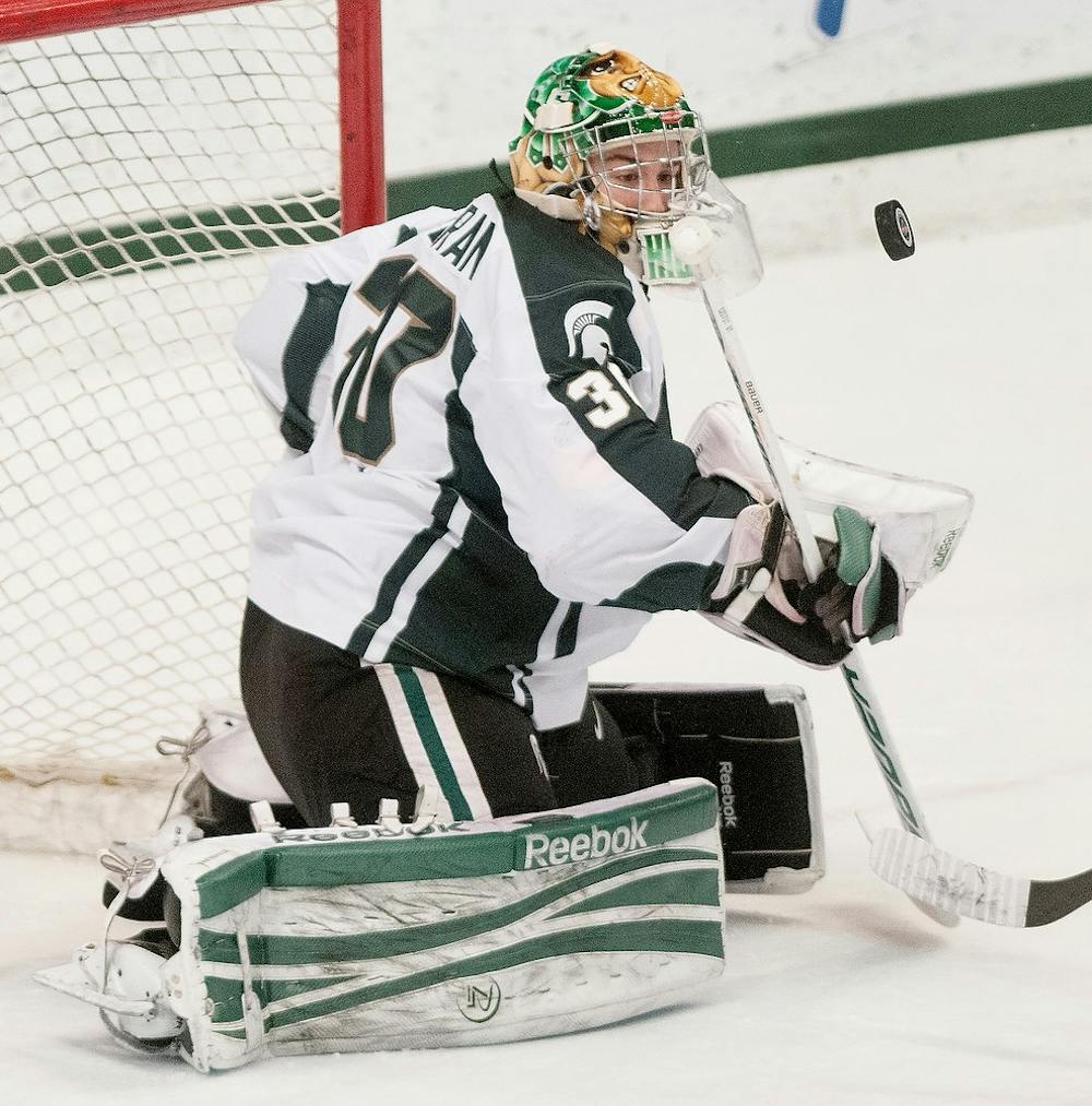 	<p>Freshman goalie Jake Hildebrand prepares to block a shot during the hockey game against Notre Dame on Friday, Jan. 11, 2013, at Munn Ice Arena. <span class="caps">MSU</span> lost the game 1-0, but split the two-game series with Fight Irish, Jan. 12, 2013. Danyelle Morrow/The State News</p>