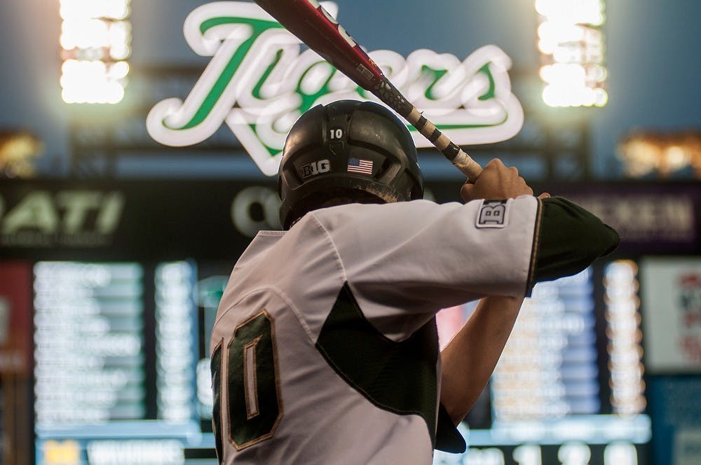 <p>Then-senior infielder Ryan Richardson stands on deck April 14, 2015, during the game against&nbsp;U-M at Comerica Park in Detroit. The Spartans defeated the Wolverines, 4-2. Allyson Telgenhof/The State News.</p>