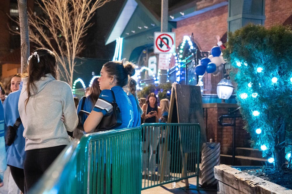<p>Disappointed Detroit Lions fans wait for rides home in downtown East Lansing after the team's 34-31 loss against the San Francisco 49ers on Jan 28, 2024.</p>