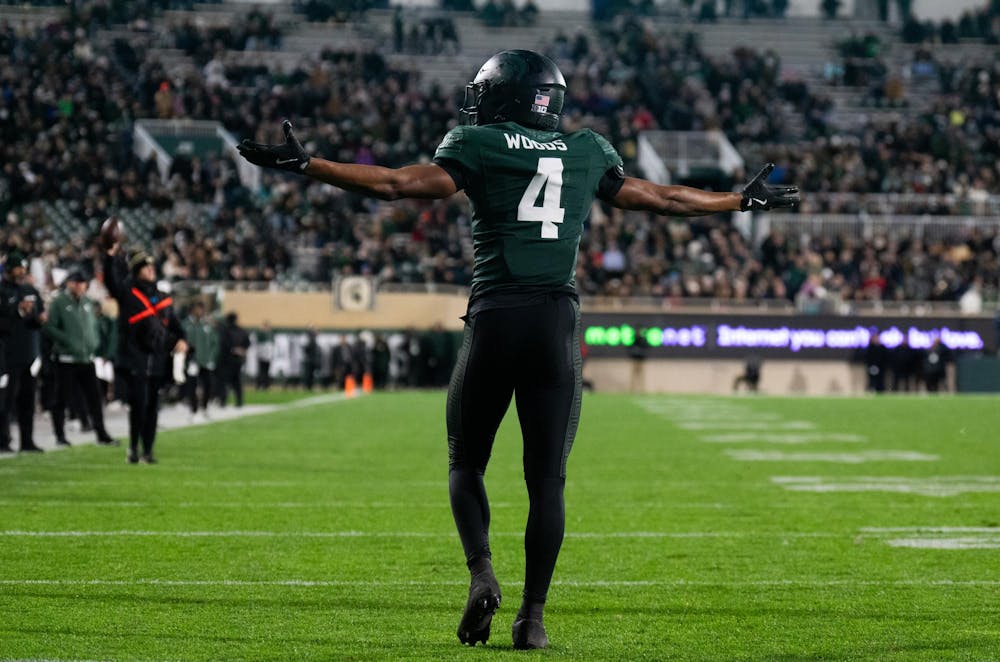 <p>MSU red-shirt junior defensive back Ed Woods (4) protests a call at Spartan Stadium on Nov. 22, 2024.</p>