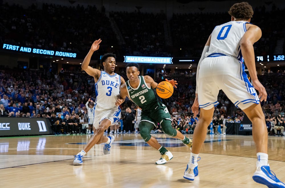 <p>Sophomore guard Jeremy Roach (3) defends against junior guard Tyson Walker (2) during Duke&#x27;s victory over Michigan State on March 20, 2022.</p>
