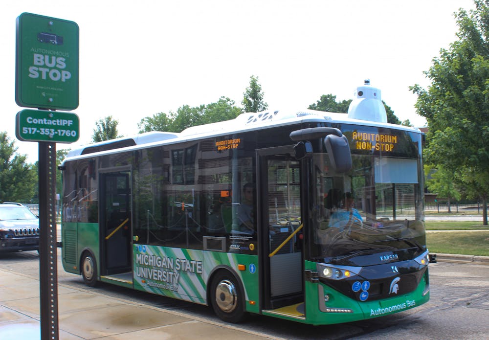 <p>MSU&#x27;s first autonomous bus stops at the Auditorium bus stop. The bus has a capacity nearing 40, but until research is complete, only 15 riders are allowed on. July 13, 2022</p>