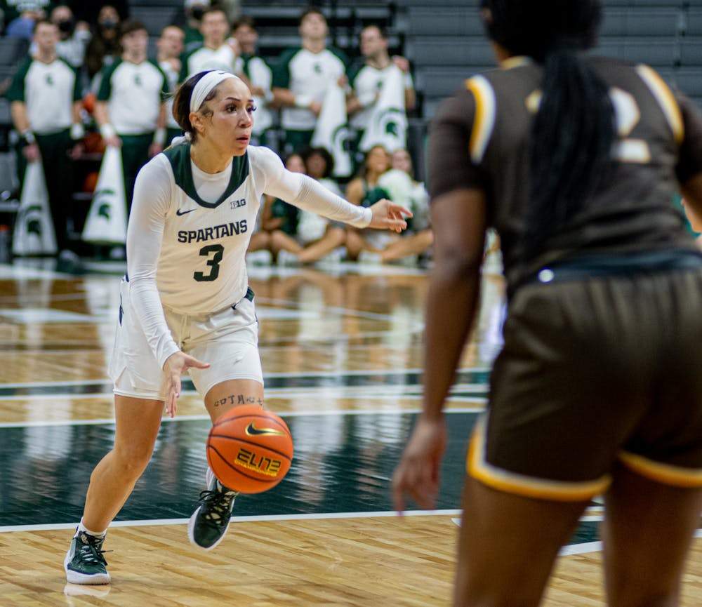 <p>Junior guard Alyza Winston moves the ball up the court at the Breslin Center on Nov. 16, 2021. Michigan State women&#x27;s basketball took down Valparaiso 73-62, as Head Coach Suzy Merchant claimed her 500th win.</p>