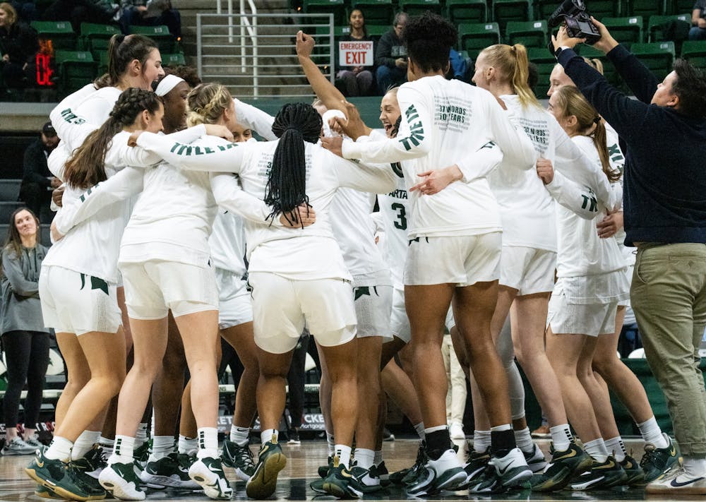 <p>The MSU women&#x27;s basketball team hype each other up before the start of the game at the Breslin Center on Nov. 15, 2022. The Spartans defeated the Grizzlies 85-39. </p>
