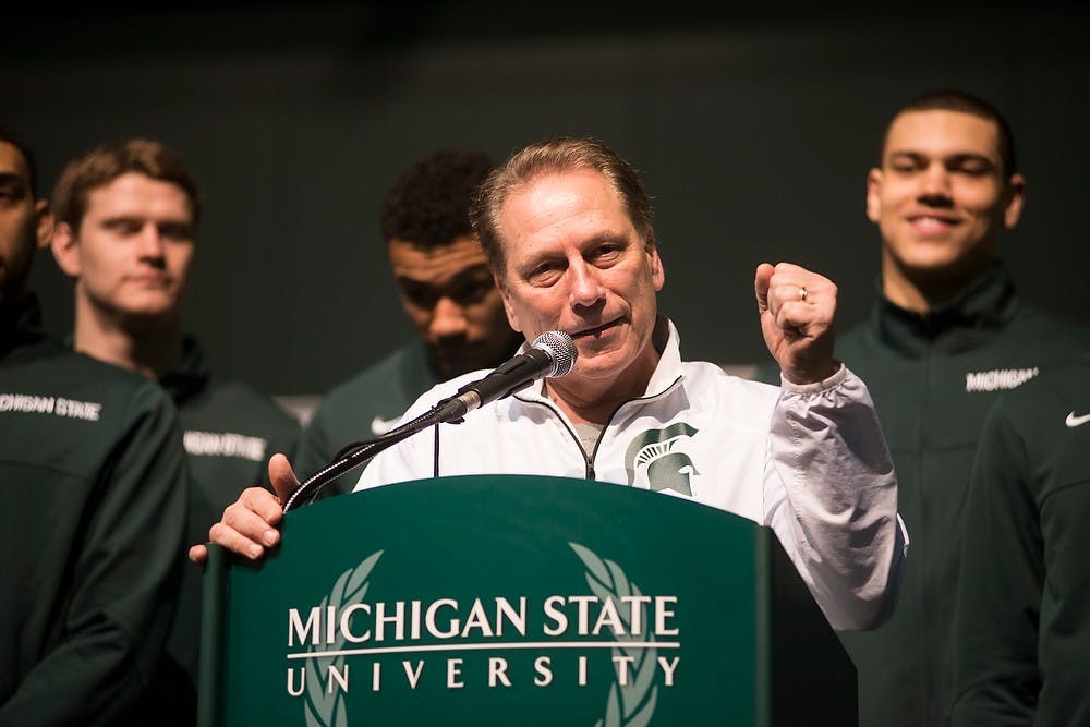<p>Head coach Tom Izzo speaks to the crowd of fans with his team behind him April 3, 2015, during a final four Spartan pep rally at the Indiana Convention Center , 100 S. Capitol Ave., in Indianapolis, Indiana. Erin Hampton/The State News</p>