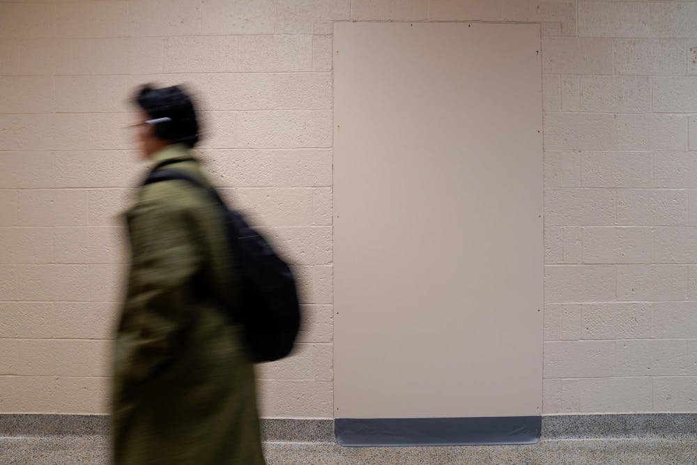 A student walks passed Berkey Hall room 114 during the first day of classes of the Spring Semester on Jan. 8, 2024. This is the first day Berkey Hall has been opened for students since the mass shooting from Feb. 13, 2023