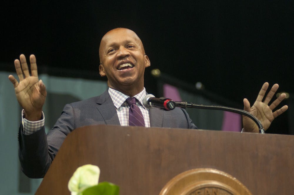 <p>Bryan Stevenson speaks to a crowd of incoming freshmen at their convocation ceremony on Aug. 31, 2015, at Breslin Student Events Center. He is the author of "Just Mercy," the book assigned to the incoming freshmen as part of the One Book One Community program. The book addresses Stevenson's work as a young lawyer fighting against abuses in the justice system and wrongful condemnation in the south. Catherine Ferland/The State News </p>