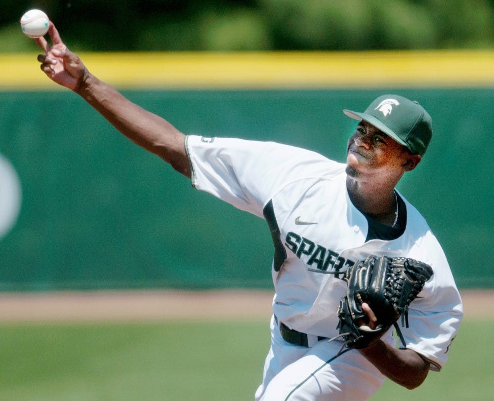 Sophomore pitcher David Garner pitches the ball during the game against Penn State on May 19, 2012 at McLane Baseball Stadium at Old College Field. The Spartans beat Penn State 9-2. State News File Photo