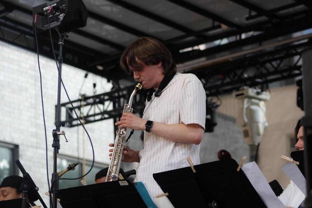 <p>A member of the Gathering Orchestra has a jazz solo on the clarinet at the East Lansing Summer Solstice Jazz Festival on June 21, 2024.</p>