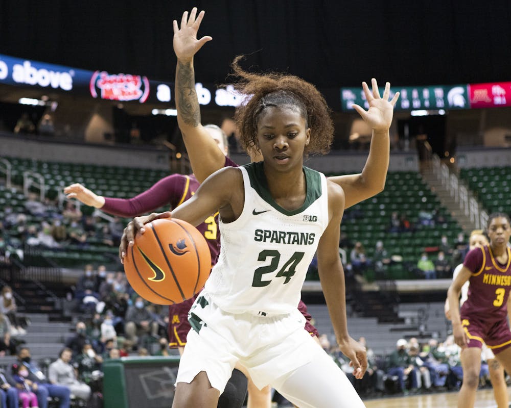 <p>Senior guard Nia Clouden receives a pass from a teammate on Jan. 23, 2022.</p>