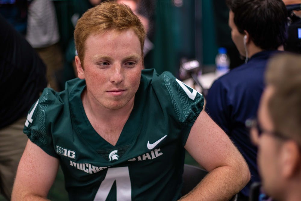 <p>Kicker Matt Coghlin (4) answers questions from the media on Aug. 6, 2018 at Spartan Stadium.</p>