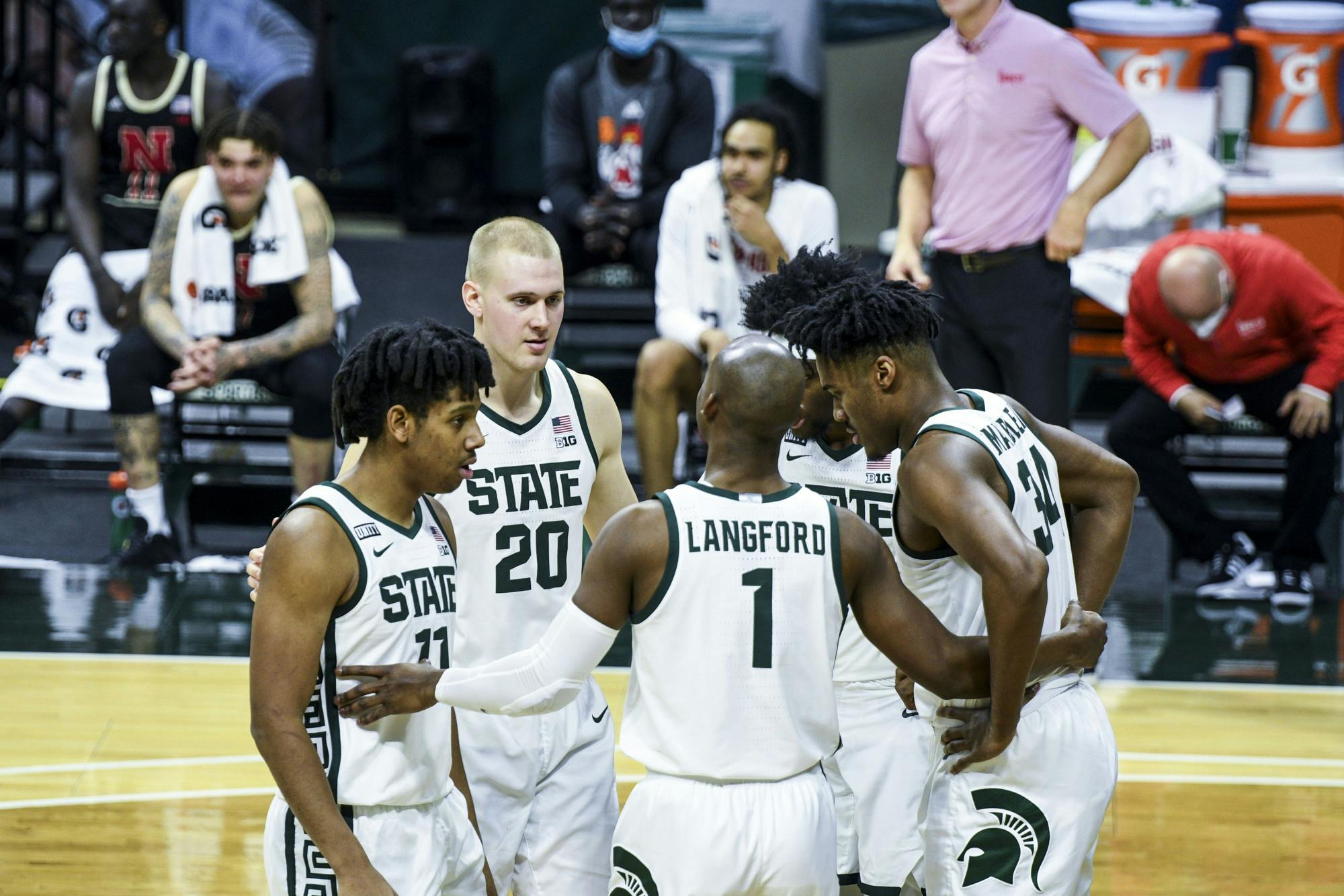 Grad student guard Joshua Langford (1) talks to his team before a free-throw during the game against Nebraska on February 6, 2021 at the Breslin Center. The Spartans defeated the Cornhuskers 66-56.