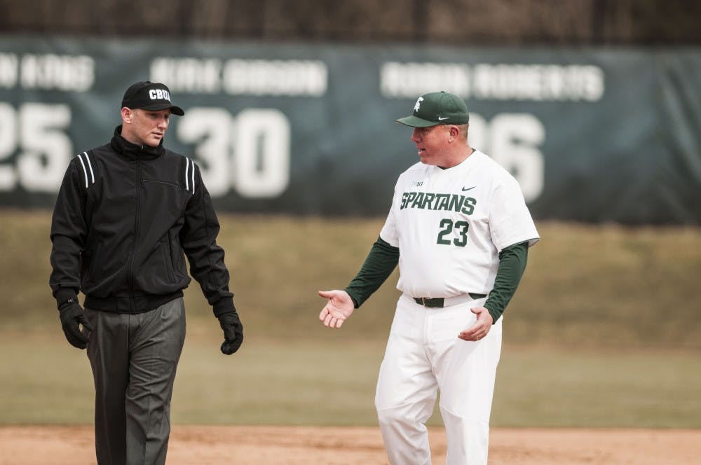 Head coach Jake Boss Jr. argues with the umpire during the game against Central Michigan on March 21, 2018 at McLane Baseball Stadium. The Spartans fell to the Chippewas, 3-1. (C.J. Weiss | The State News)