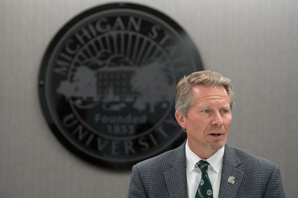 Michigan State University President Kevin Guskiewicz answers media questions after the Oct. 25, 2024 Board of Trustees meeting at the Hannah Administration building.