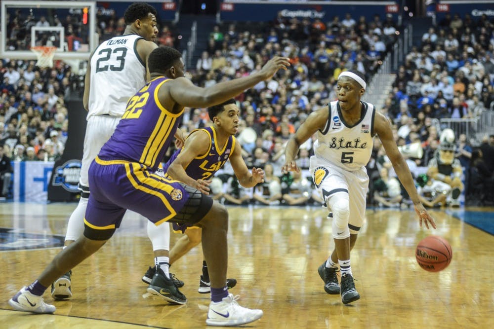 Junior guard Cassius Winston (5) moves with the ball during the game against LSU at Capital One Arena on March 29, 2019. The Spartans defeated the Tigers, 80-63.