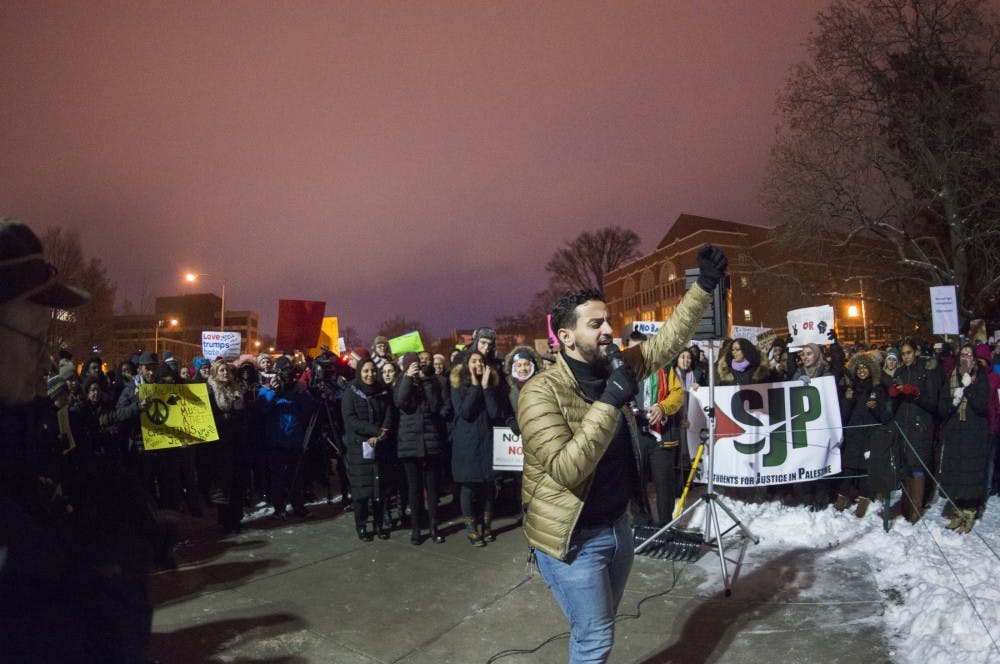 Senior political theory and constitutional democracy and pre-med Abraham Aiyash leads chant on Jan. 31, 2017 at The Rock. Aiyash is the president of the The Michigan State Muslim Students' Association who hosted a "No Ban, No Wall: Spartans for Sanctuary and Solidarity" as a response to President Trump's executive order on Muslim immigrants and refugees.