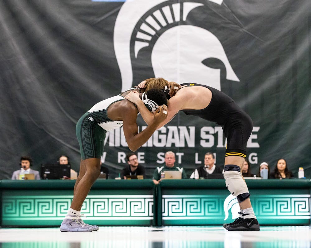 MSU R-So. Wt. 141/149, Clayton Jones, engages his Iowa opponent in the Jenison Field House in East Lansing, MI on Feb. 8, 2026.