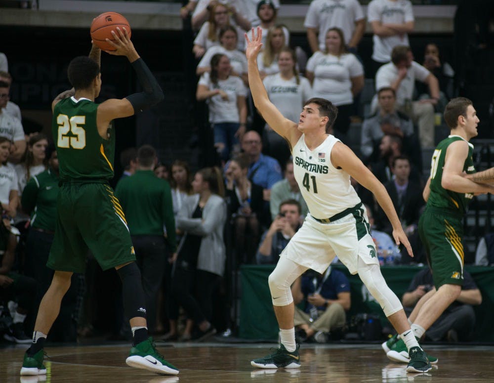 Red shirt junior guard Connor George (41) blocks the ball during the game against Northern Michigan at Breslin Center on Oct. 30, 2018. The Spartans defeated the Wildcats, 93-47.