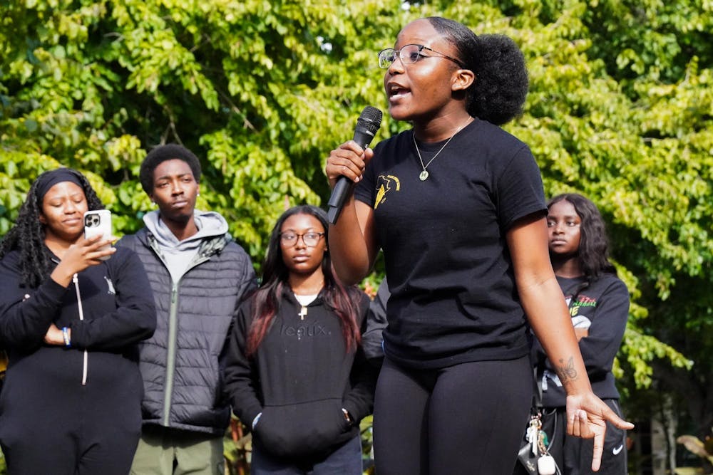The Black Students Alliance and National Association for the Advancement of Colored People organize a protest of racial injustice outside of the Student Services Building at Michigan State University on Oct. 18, 2023.