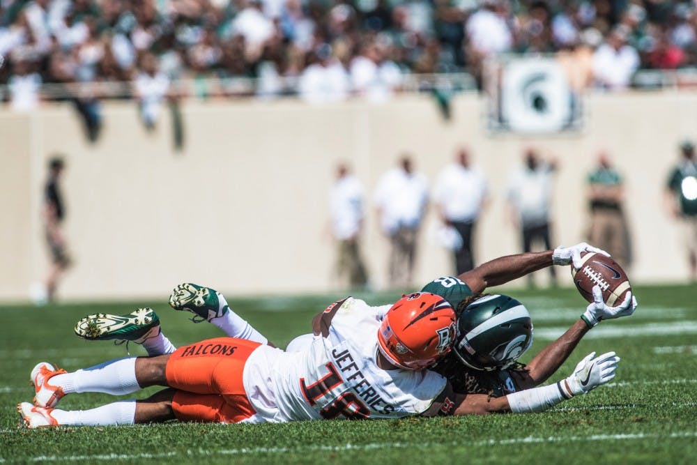 Sophomore cornerback Josh Butler (18) catches the ball during the game against Bowling Green on Sept. 2, 2017 at Spartan Stadium. The Spartans defeated the Falcons, 35-10. 