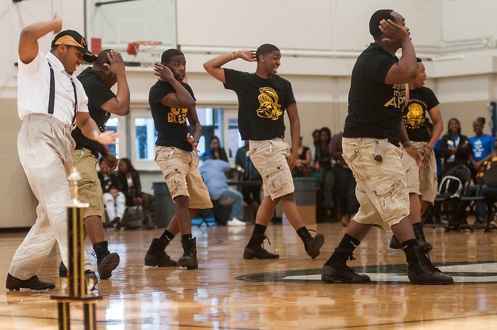 <p>The Alpha Phi Alpha Fraternity perform April 5, 2014, during the Divine Nine Stroll Off at IM Sports-West. All nine of the sororities and fraternities had to perform "step" choreography that related to one's sorority or fraternity. Erin Hampton/The State News</p>