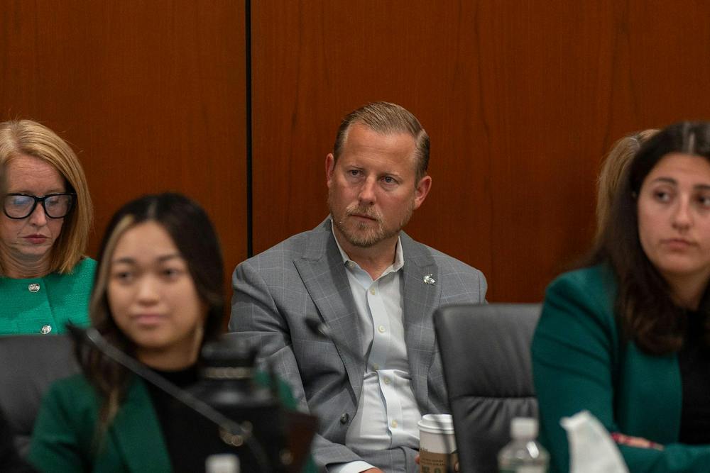 <p>MSU Athletic Director Dan Bartholomae sits at the MSU Board of Trustees meeting in East Lansing, Mich., on Sept. 11, 2026.</p>