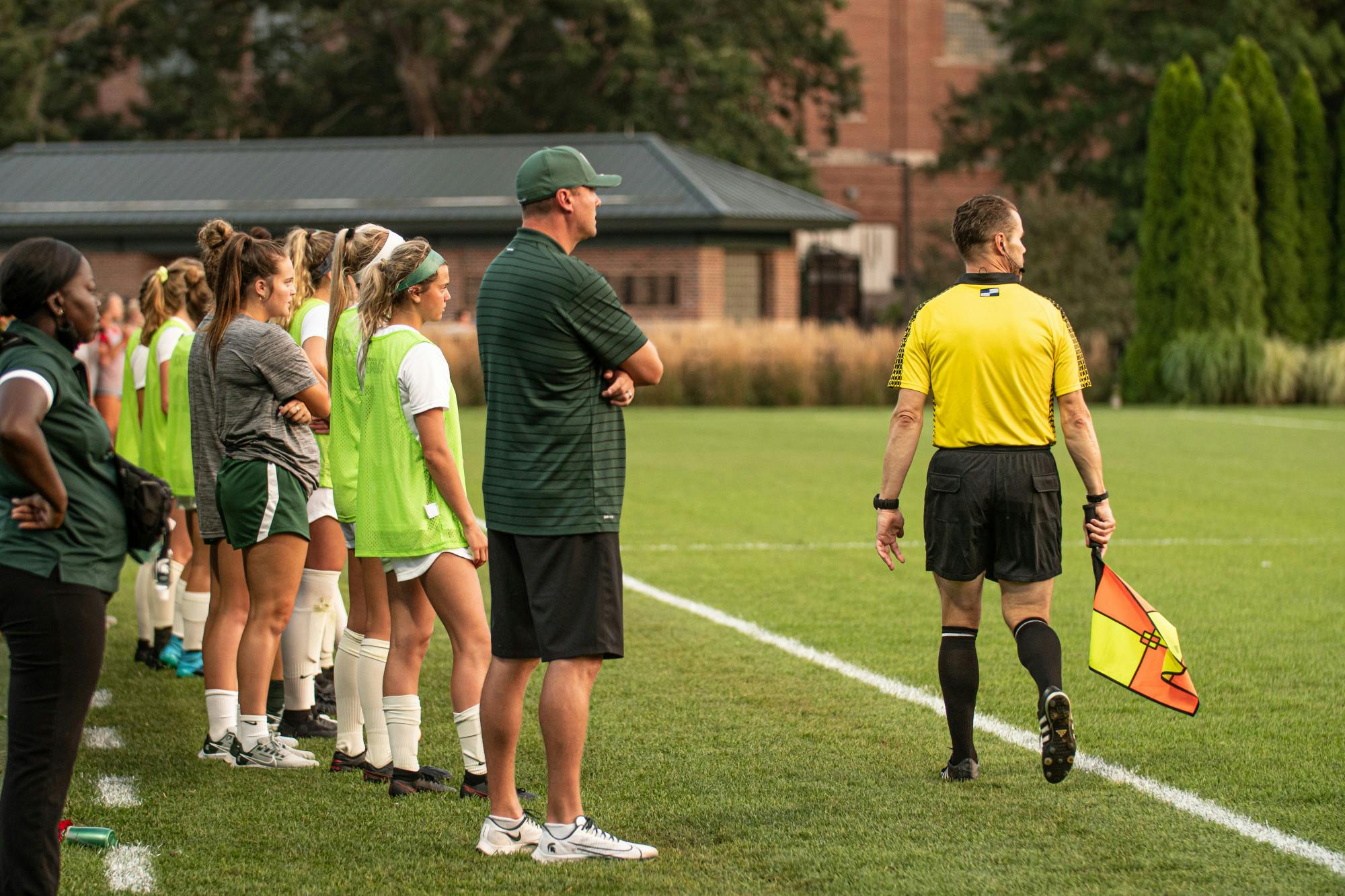 <p>Michigan State Head Coach Jeff Hosler addresses his team, photo courtesy of MSU Athletics and Maria Babcock.</p>