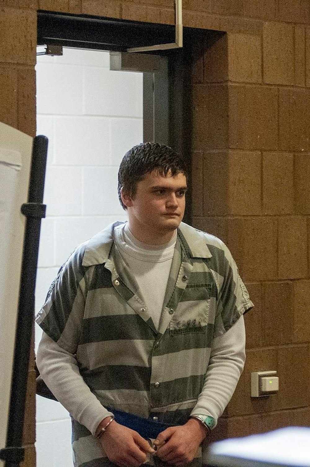 	<p>Okemos resident Connor McCowan is walks into the after a brief break during the preliminary exam of the fatal stabbing of <span class="caps">MSU</span> student Andrew Singler on April 18, 2013, at Ingham County District Judge Donald Allen&#8217;s courtroom in Mason, Mich. McCowan is standing trial for allegedly killing 23-year-old Singler in February. Natalie Kolb/The State News</p>