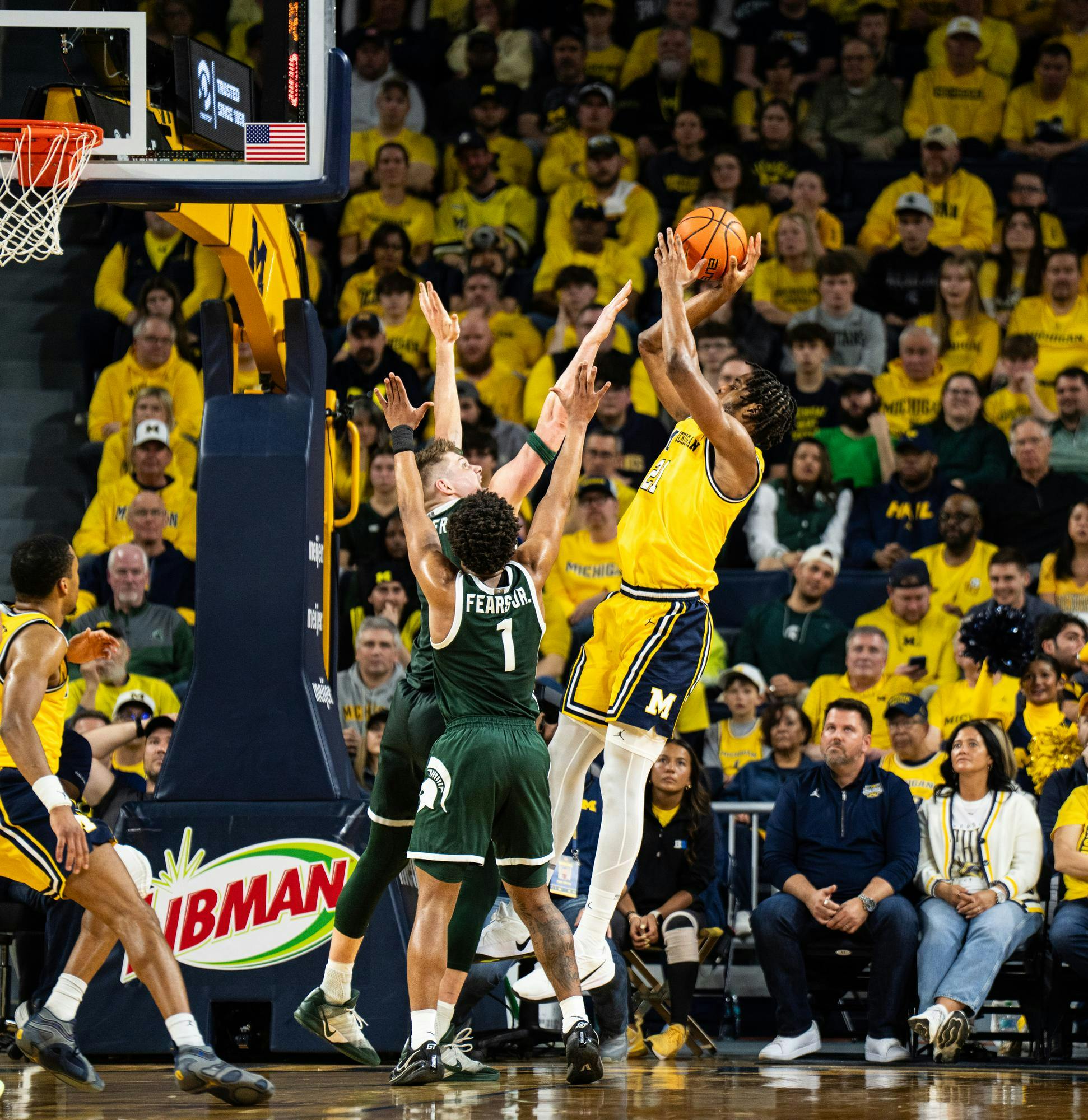 <p>The University of Michigan's sophomore forward Morez Johnson Jr. (21) prepares to score over Michigan State at the Crisler Center in Ann Arbor, Michigan on Sunday, March 8, 2026.</p>