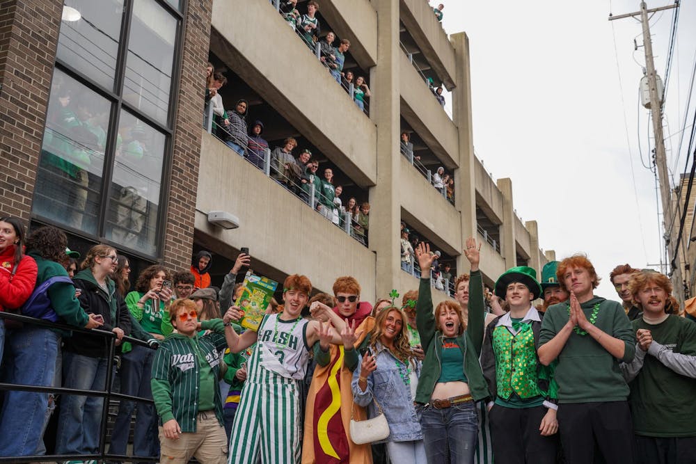 Michigan State University students gather in downtown East Lansing, Mich., for the Ginger Run on Saturday, March 14, 2026. 