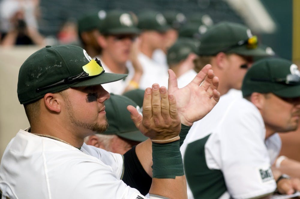 	<p>Senior catcher Seth Williams cheers on his team as <span class="caps">MSU</span> holds Minnesota in the ninth inning Saturday at Huntington Park in Columbus, Ohio. The Spartans beat the Golden Gophers, 6-3, and will once again face Illinois today at 7:05. Kat Petersen/The State News</p>