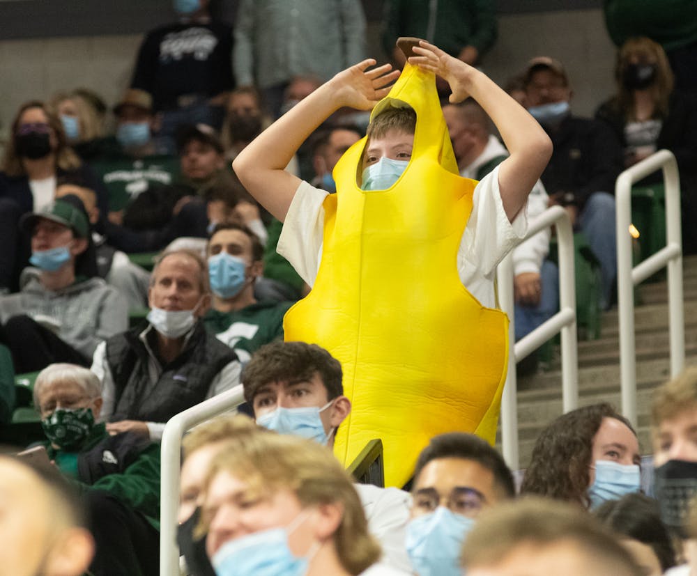 <p>A kid in a banana costume cheers during Michigan State&#x27;s victory over Ferris State on Oct. 27, 2021.</p>