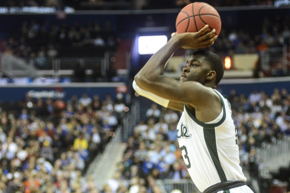 Freshman forward Gabe Brown (13) shoots the ball during the game against LSU at Capital One Arena on March 29, 2019. The Spartans defeated the Tigers, 80-63.