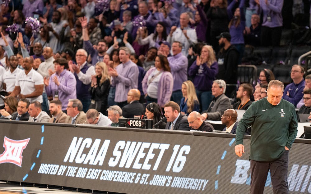 <p>Michigan State head men's basketball coach Tom Izzo walks back to the bench during the Spartans' Sweet Sixteen matchup with Kansas State at Madison Square Garden on Mar. 23, 2023. The Spartans lost to the Wildcats 98-93 in overtime.</p>