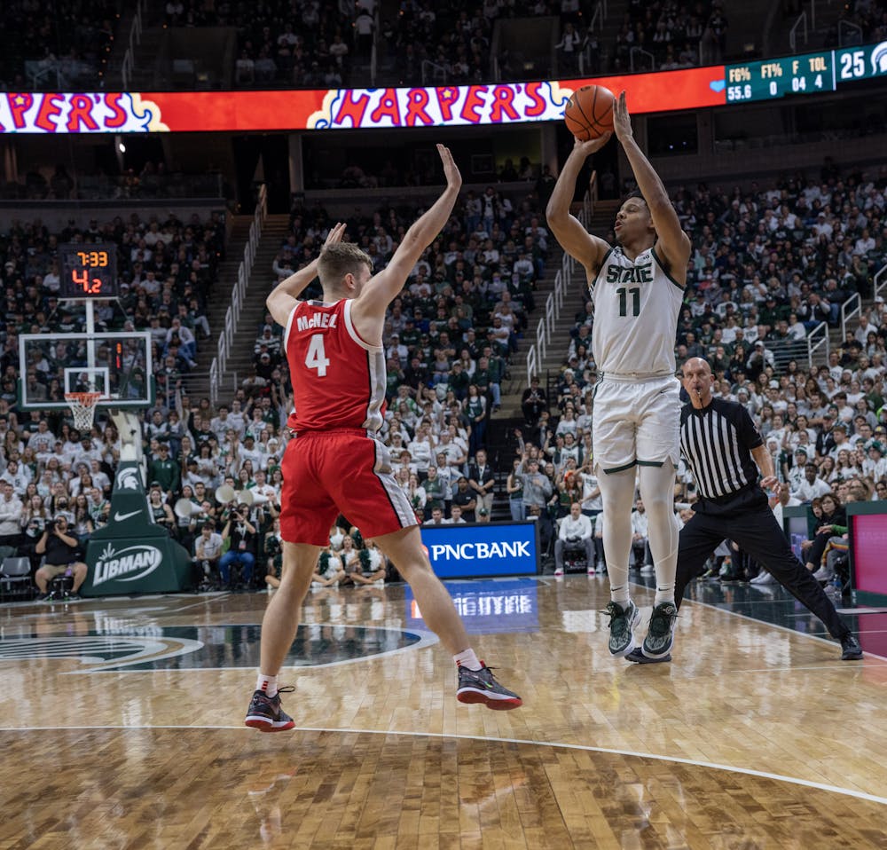 <p>Senior guard A.J Hoggard takes a shot against Ohio State on March 4, 2023.</p>