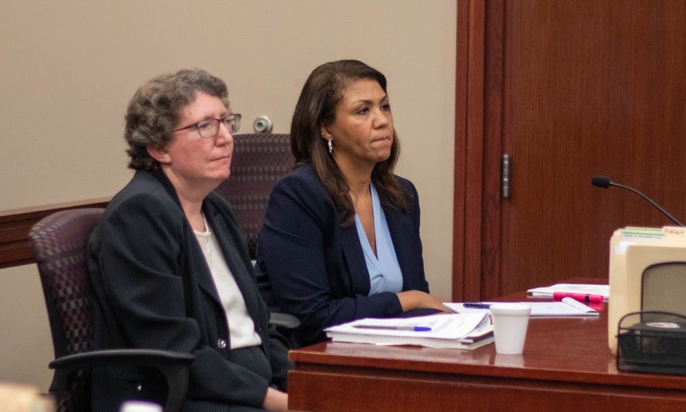 Nassar’s attorneys Jacqueline McCann, left, and Malaika Ramsey-Heath, right, listen to Judge Rosemarie Aquilina in court on Aug. 27, 2018 at Ingham County Circuit Court. McCann and Ramsey-Heath filed an appeal to have Aquilina removed.