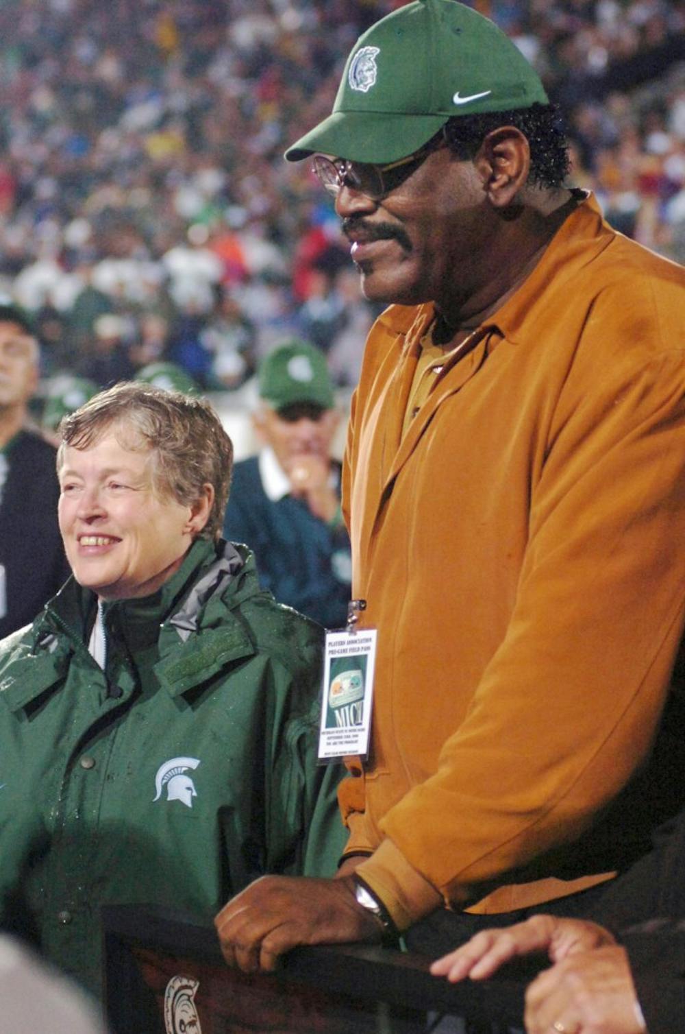 	<p>Bubba Smith stands by as President Lou Anna K. Simon as his number 95 jersey is being retired Sept. 23, 1996 before the start of the game against Notre Dame. Smith was found dead in his Los Angeles home Wednesday.</p>