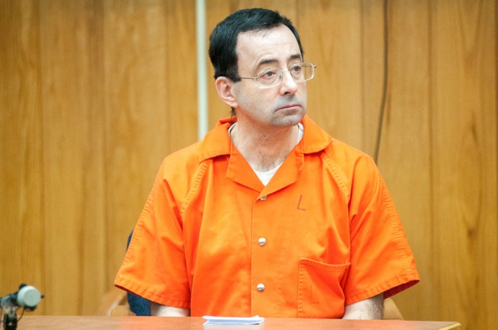 <p>&nbsp;<br>
</p>
<p>Ex- MSU and USA Gymnastics physician Larry Nassar listens to Judge Cunningham on the third day of sentencing on Feb. 5, 2018 in the Eaton County courtroom. Nassar faces three counts of criminal sexual conduct in Eaton County.</p>