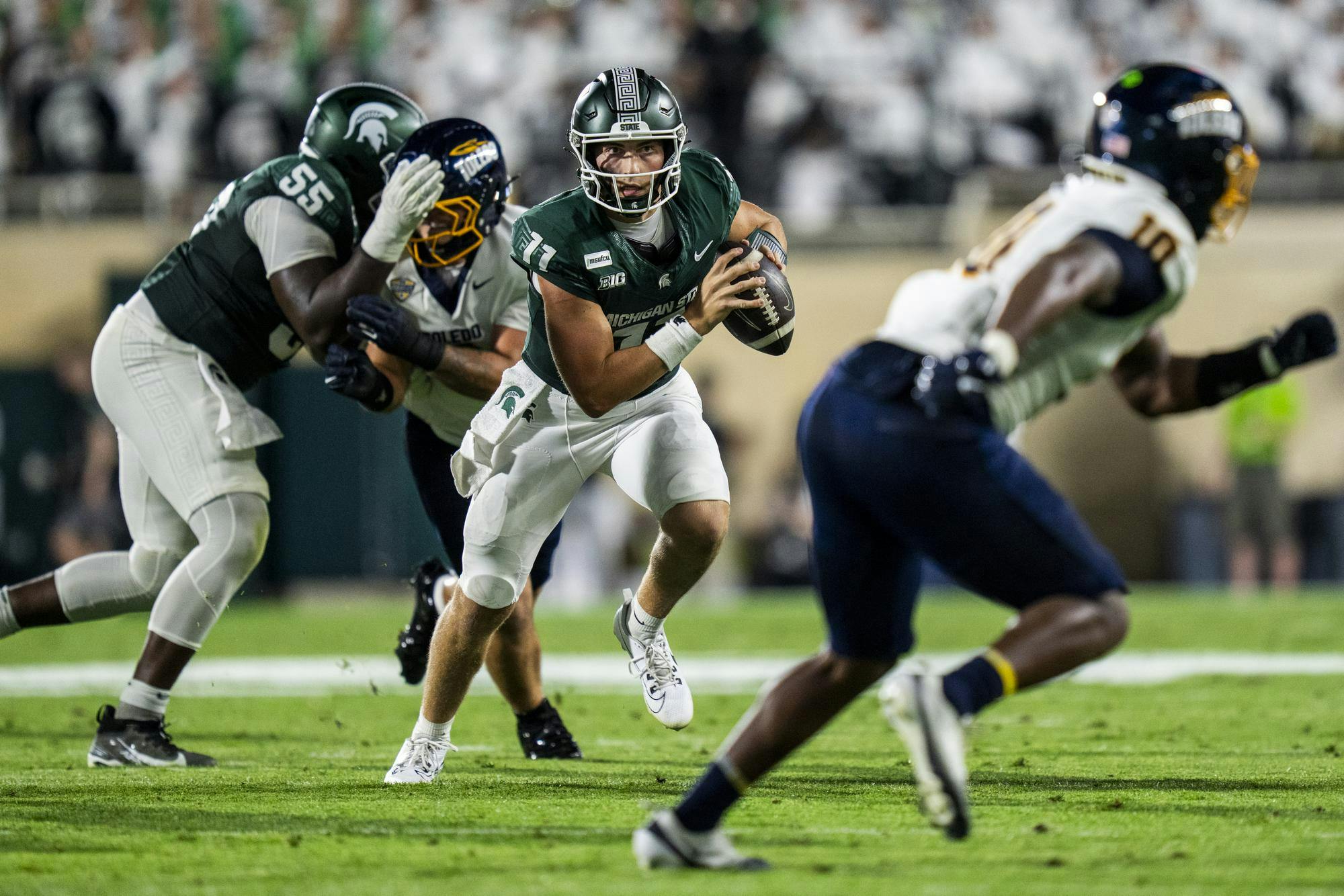 <p>Michigan State sophomore quarterback Alessio Milivojevic (11) drives the ball down the field during the Michigan State vs. Toledo football game at Spartan Stadium in East Lansing, Mich., on Friday, Sept. 4, 2026.</p>