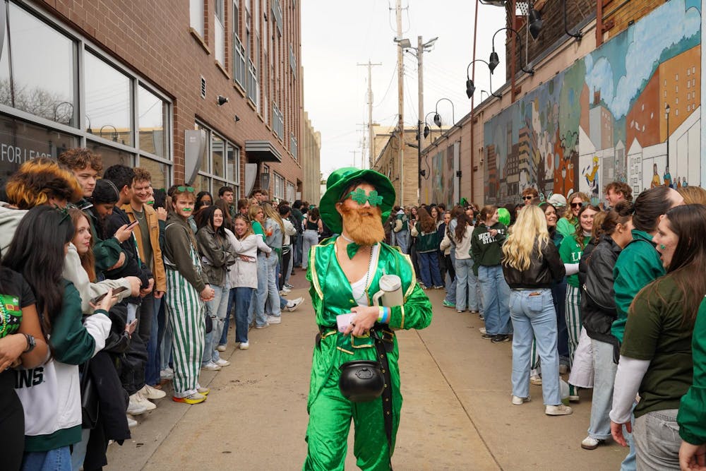Michigan State University students gather in downtown East Lansing, Mich., for the Ginger Run on Saturday, March 14, 2026.