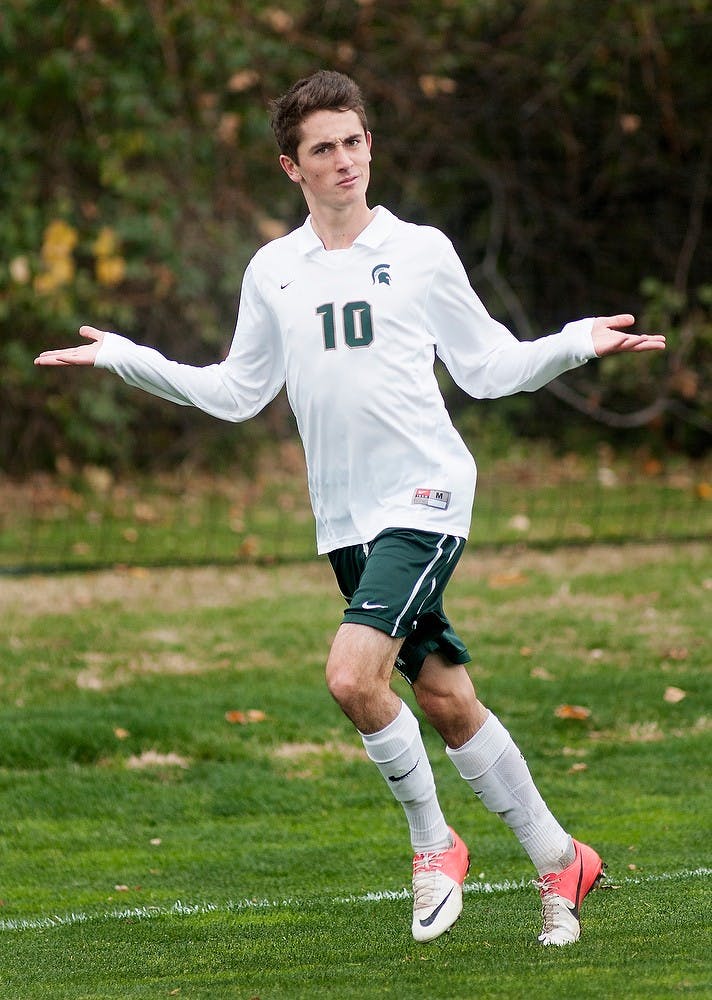 Freshman midfielder Jay Chapman does a dance on the field after scoring a goal during the game against Indiana on Oct. 28, 2012, at DeMartin Stadium at Old College Field. Chapman recorded his first three collegiate goals during the game, leading the Spartans to a 3-1 victory over the Hoosiers. Natalie Kolb/The State News