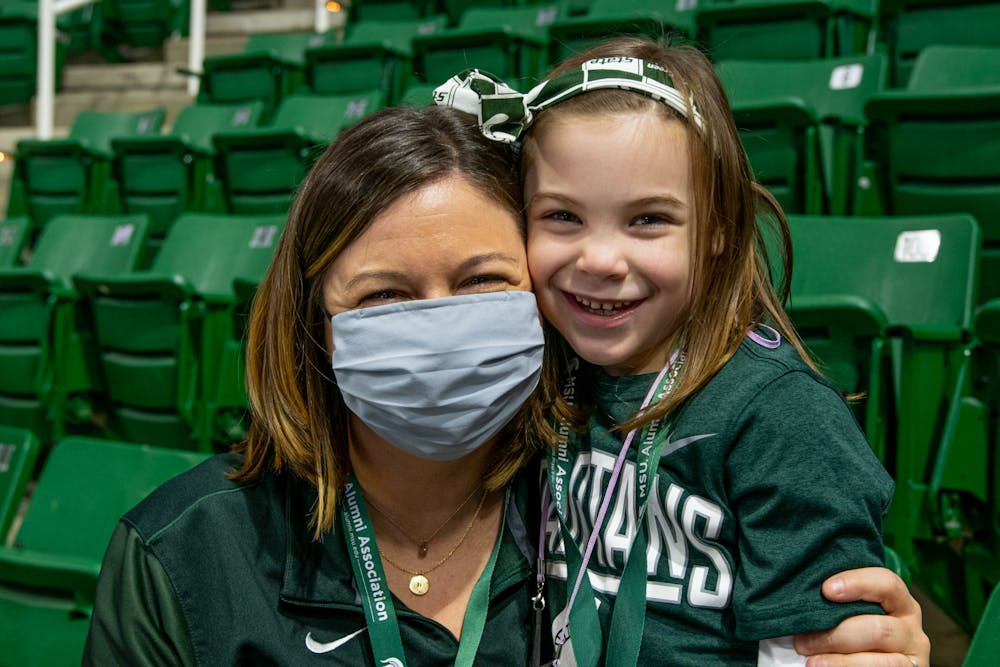 Pamela and Cecelia Jones pose for a portrait at Michigan State's women's basketball game against Notre Dame on Dec. 2, 2021.