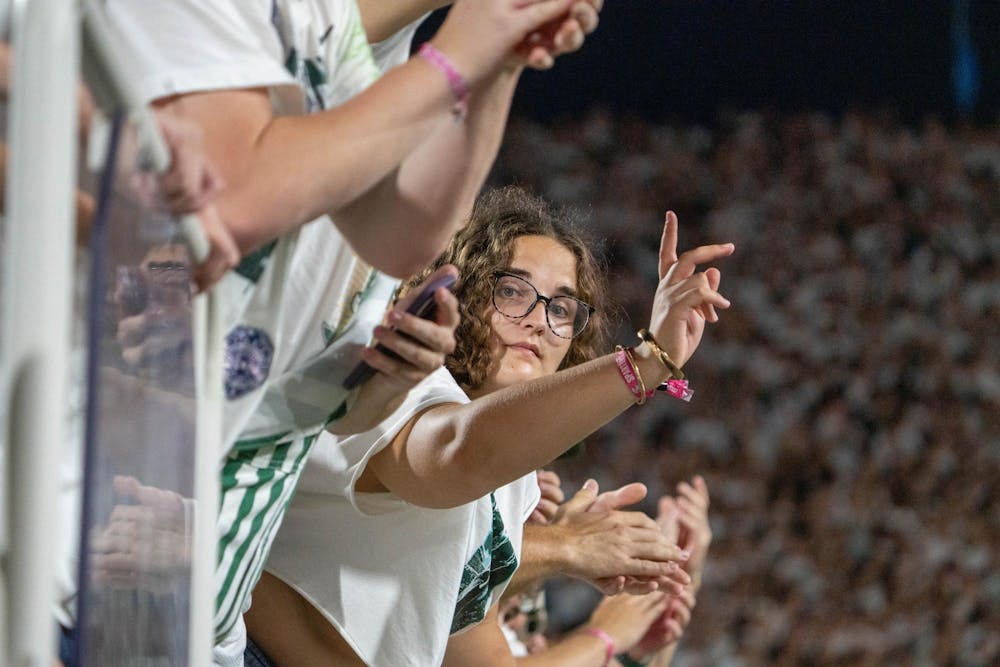 <p>MSU fans react to a play during the Michigan State vs. Toledo football game at Spartan Stadium in East Lansing, Mich., on Friday, Sept. 4, 2026.</p>
