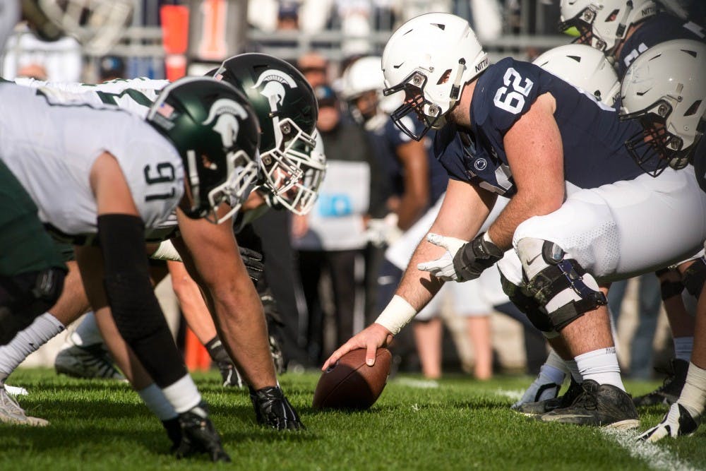 <p>MSU and Penn State line up during the game on Oct. 13, 2018 at Beaver Stadium. The Spartans defeated the Nittany Lions, 21-17.</p>