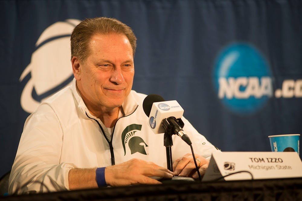 <p>Head coach Tom Izzo listens to a question March 28, 2015, during a press conference at the Carrier Dome in Syracuse, New York. The Spartans will play Louisville tomorrow night in the Elite Eight to determine who will go on to play in the final four. Erin Hampton/The State News</p>