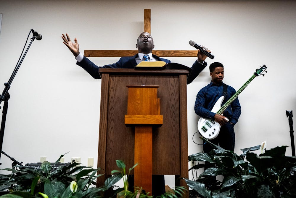 Pastor Michael Venyah, also known as the “Wells Preacher,” speaks during a Sunday worship service at Soulwinners Fellowship Church in Lansing, Mich., on Sunday, April 12, 2026.