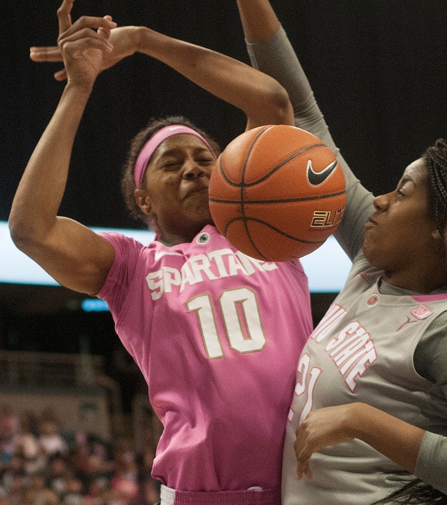 	<p>Redshirt freshman Branndais Agee loses the ball after contact with Ohio State redshirt freshman Lisa Blair on Feb. 15, 2014, at Breslin Center. The Spartans are leading at halftime, 42-21. Erin Hampton/The State News</p>