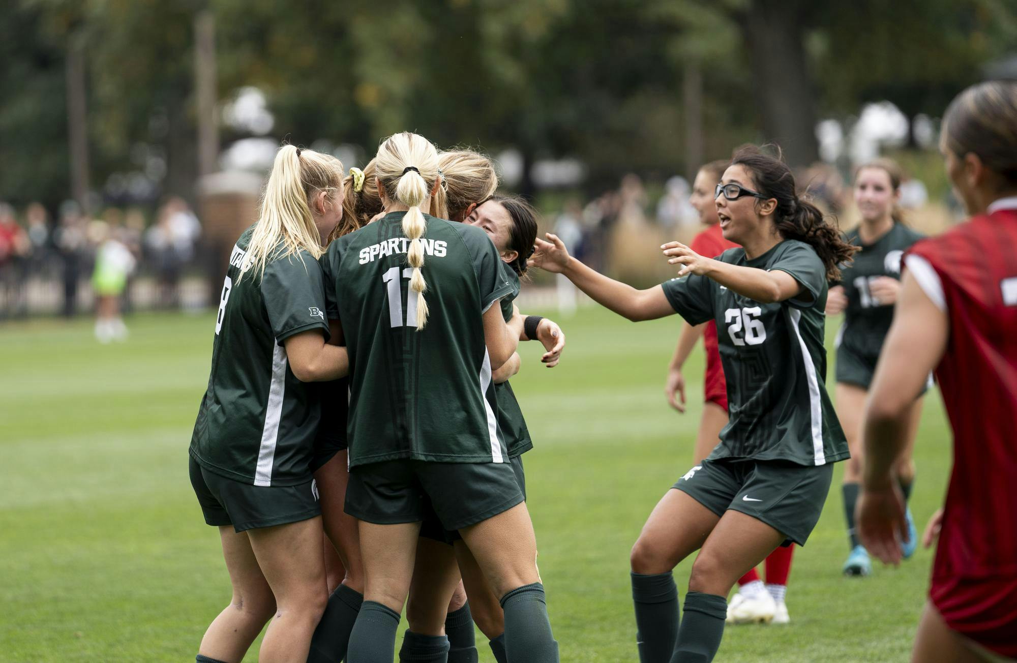 <p>The MSU women’s soccer team celebrates together after scoring against Rutgers University at the game on Sept. 29, 2024.</p>