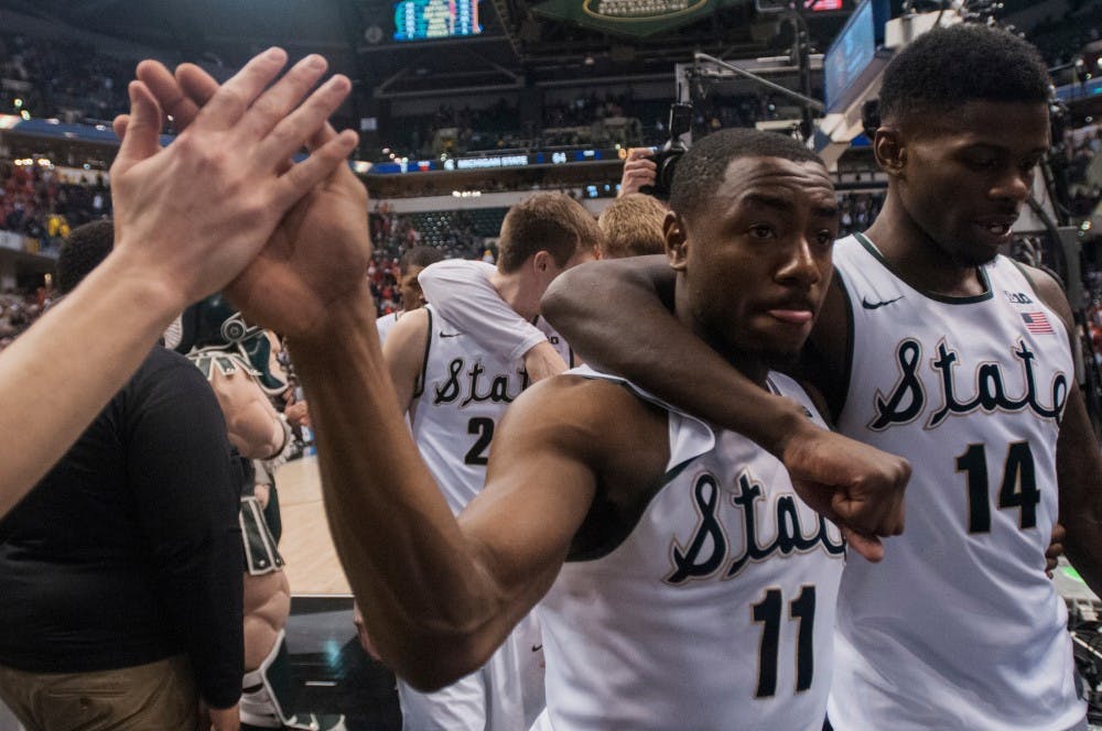 Sophomore guard Lourawls Nairn Jr., left, and junior guard Eron Harris, right, after the game on March 12, 2016 at Bankers Life Fieldhouse in Indianapolis, Indiana. The Spartans defeated theTerrapins 64-61. 