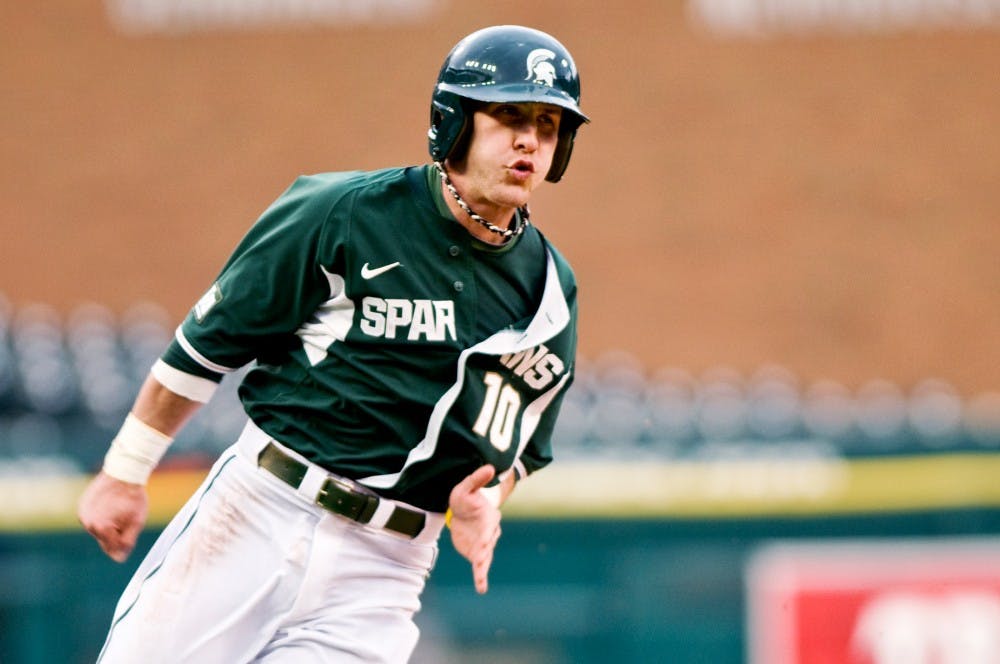 	<p>Sophomore second baseman Ryan Jones rounds third base and heads home Wednesday at Comerica Park in Detroit. Jones scored the first run of the game for the Spartans kicking off what would to a 3-1 victory against Central Michigan in the Clash at Comerica. Matt Radick/The State News</p>